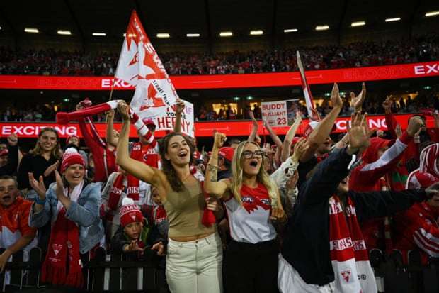Swans fans celebrate after the siren at the SCG.