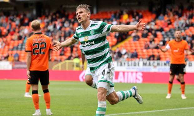 Carl Starfelt celebrates scoring Celtic’s ninth against Dundee United.