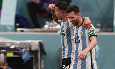 Messi celebrates Argentina’s second goal with the scorer, Enzo Fernández.