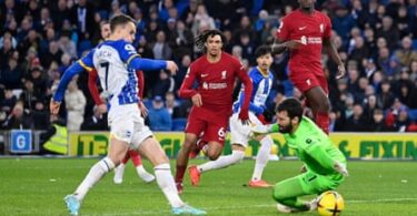Solly March beats Allison in Brighton’s victory over Liverpool earlier this month.