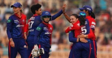 The Delhi Capitals celebrate a wicket against Royal Challengers Bangalore.