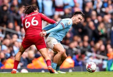 Jack Grealish spins away from Trent Alexander-Arnold
