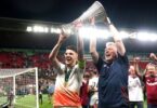 West Ham’s Declan Rice (left) and David Moyes lift the Europa Conference League trophy.